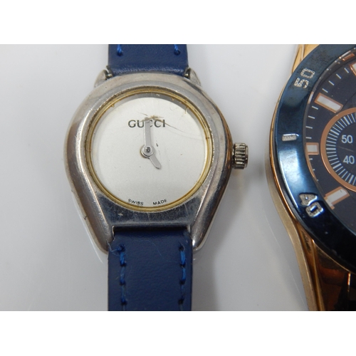 333 - Ladies Swiss Gucci Wristwatch together with three dress watches