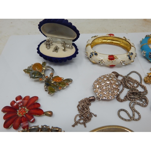 334 - A Large Quantity of Costume Jewellery: Sorting will reward