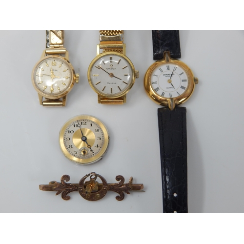 50 - 9ct Gold Brooch, Ladies 18ct Gold Plated Raymond Weil watch, Ladies Omega watch, a further watch and... 