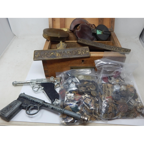 999A - A Wooden Box containing a Quantity of Militaria Including Brass A.R.P & Air Warden Plaques, Cap Gun,... 