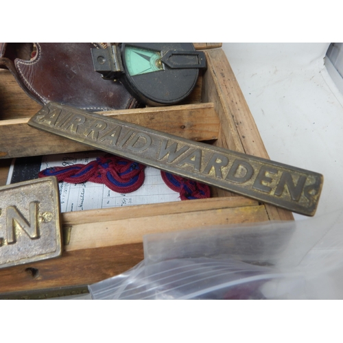 999A - A Wooden Box containing a Quantity of Militaria Including Brass A.R.P & Air Warden Plaques, Cap Gun,... 