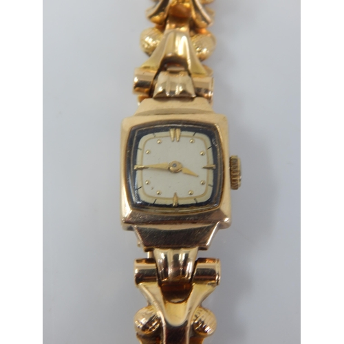 102 - 18ct Gold Ladies Wristwatch on 18ct Gold Strap: Gross weight 21.75g