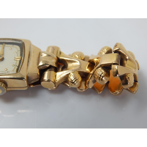 102 - 18ct Gold Ladies Wristwatch on 18ct Gold Strap: Gross weight 21.75g