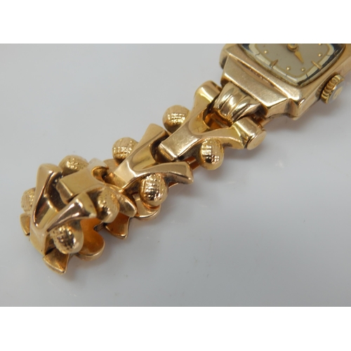 102 - 18ct Gold Ladies Wristwatch on 18ct Gold Strap: Gross weight 21.75g