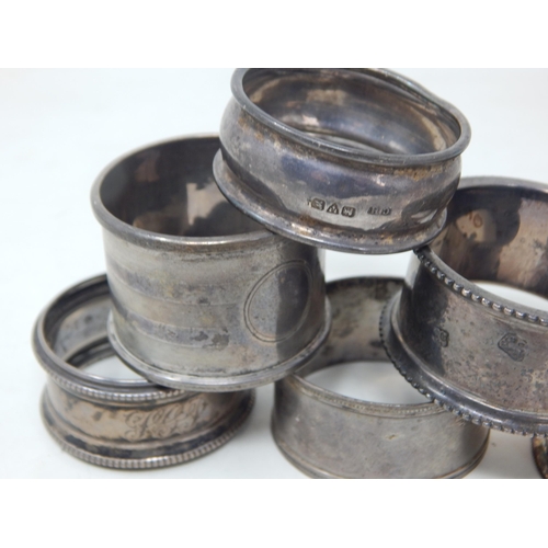 69 - A Quantity of Hallmarked Silver Napkin Rings: Various Dates & Makers: Weight 85g