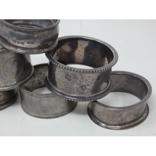 69 - A Quantity of Hallmarked Silver Napkin Rings: Various Dates & Makers: Weight 85g