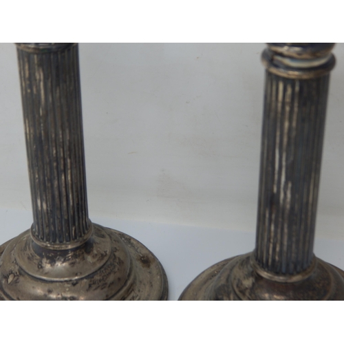 73 - A Pair of Silver Candlesticks: Hallmarked Birmingham 1913 by William Deakin: Height 17.5cm