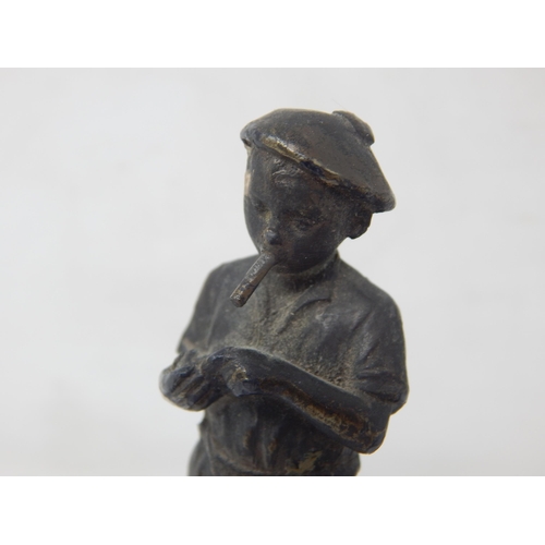 206 - A Bronze Desk Seal Formed as a Smoking Boy: Height 9.5cm: Repaired.