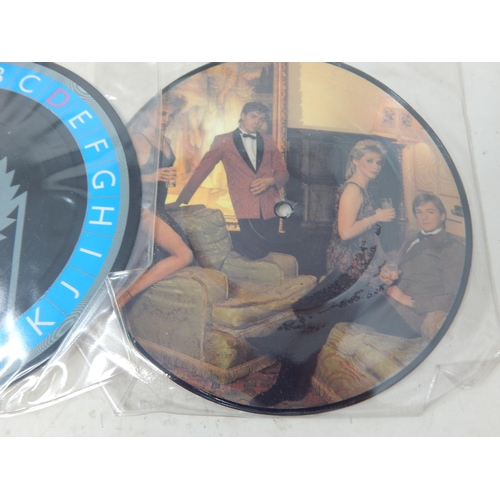 216 - RECORDS: A Quantity of 1980's Picture Discs Including: G.B.H, Toyah, Wham, Janet Jackson, Culture Cl... 