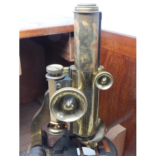 225 - Late 19th Century Triple Nosepiece Microscope by Baker, High Holborn, London with three objective le... 