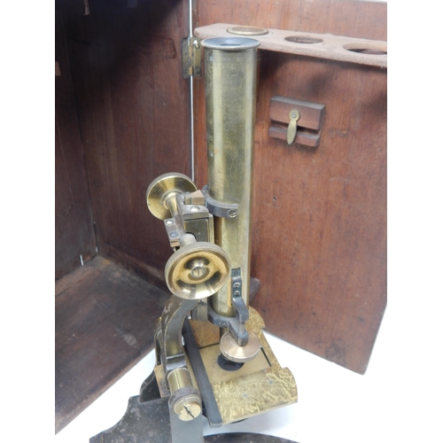 226 - Edwardian Brass Student Microscope with a single detachable eyepiece with a large range of magnifica... 