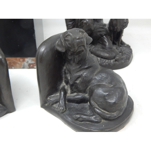 266 - A Pair of Dog Bookends together with figures of a man with dog and a naked lady on marble plinth.