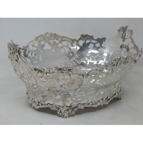 131 - Large Victorian Silver Fruit Basket Hallmarked London 1899 by John Carrington: Measures 28.5cm wide:... 