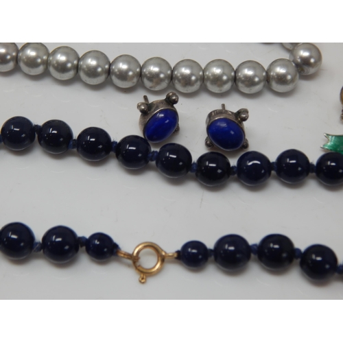 137 - A Large Quantity of Costume Jewellery Including a Lapis Lazuli Necklace, Silver Earrings, Calvin Kle... 