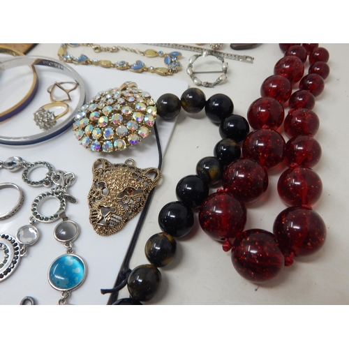 137 - A Large Quantity of Costume Jewellery Including a Lapis Lazuli Necklace, Silver Earrings, Calvin Kle... 