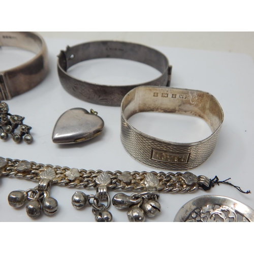 141 - A Quantity of Silver Including a Napkin Ring, Pencil, Bracelets, Bangles etc: Weight 220g