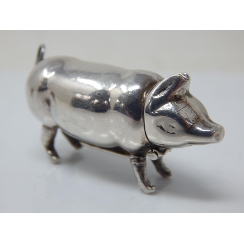 145 - Hallmarked Silver Pig Vesta Case together with a similar brass example