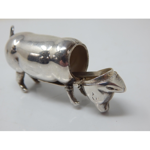 145 - Hallmarked Silver Pig Vesta Case together with a similar brass example