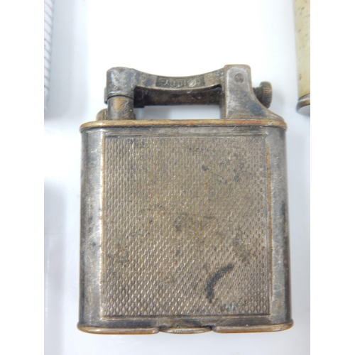 276 - A Collection of Vintage Lighters Including an early example by Dunhill