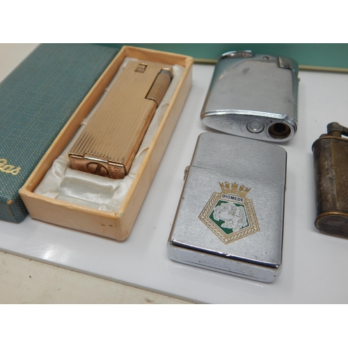 276 - A Collection of Vintage Lighters Including an early example by Dunhill