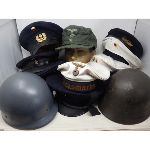 310 - A Quantity of Military Caps & Helmets