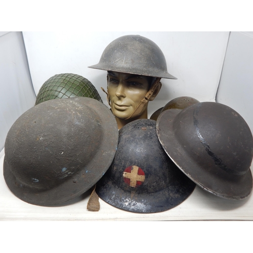 311 - A Quantity of Military Helmets