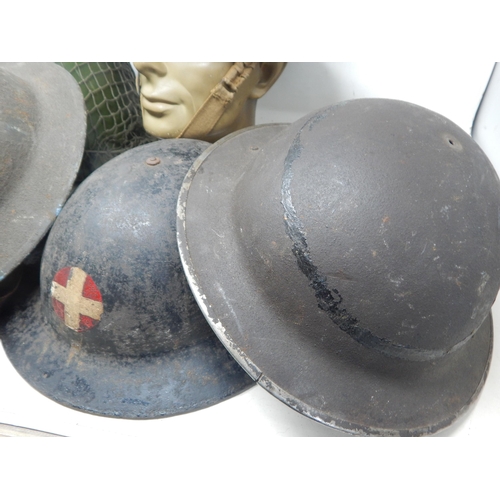 311 - A Quantity of Military Helmets