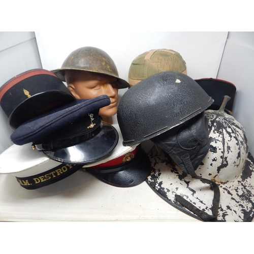 314 - A Quantity of Military Caps & Helmets