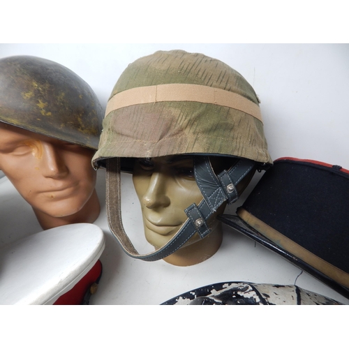 314 - A Quantity of Military Caps & Helmets