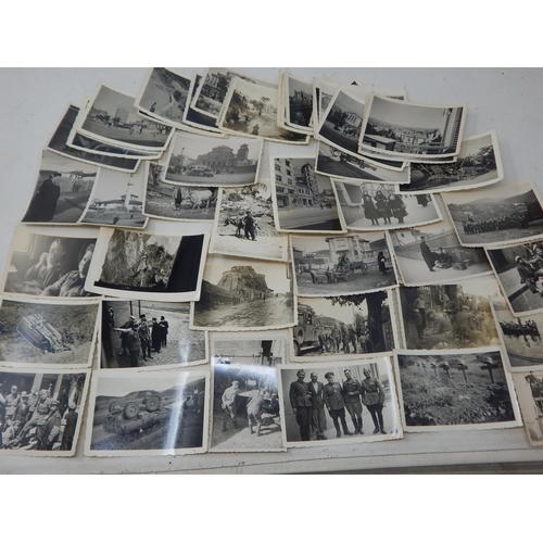 318 - WWII: A German Soldiers collection of Military Photographs etc (51)