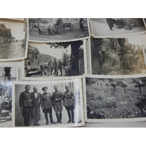 318 - WWII: A German Soldiers collection of Military Photographs etc (51)