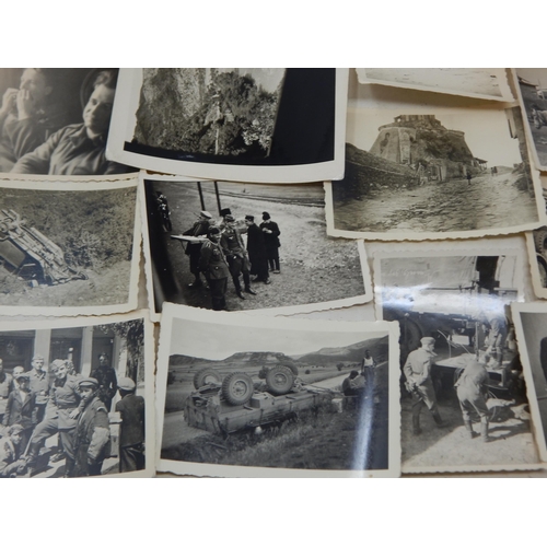 318 - WWII: A German Soldiers collection of Military Photographs etc (51)