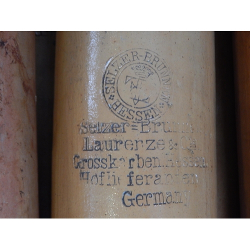 329 - A Collection of WWI German Stoneware Bottles (8) contained in a J. Walker Whisky Wooden Case