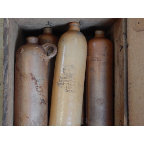 329 - A Collection of WWI German Stoneware Bottles (8) contained in a J. Walker Whisky Wooden Case