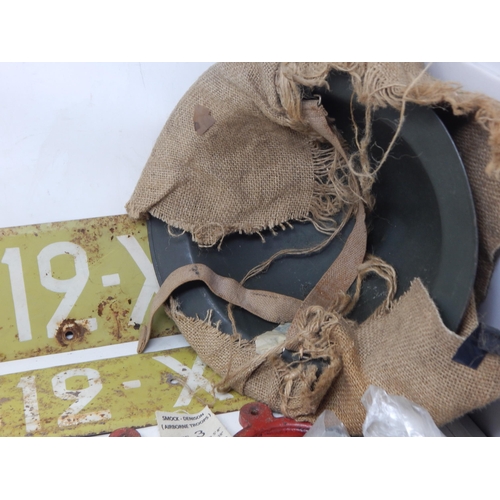 333 - A Quantity of Militaria Including Helmet, Cast Iron Signs, Bosuns Whistle etc