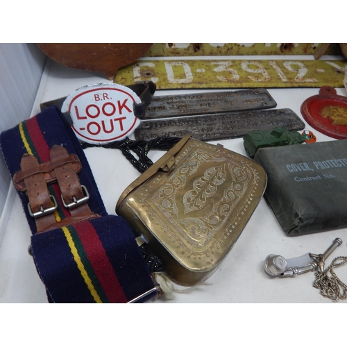 333 - A Quantity of Militaria Including Helmet, Cast Iron Signs, Bosuns Whistle etc