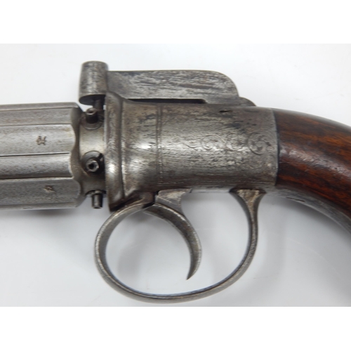 307A - Cased Georgian English 'pepperbox' percussion revolver pistol with six 8cm barrels, each barrel with... 