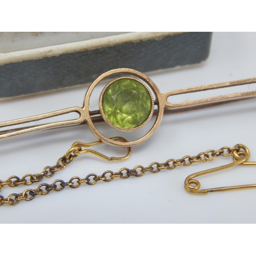 161 - 15ct Gold Brooch Set with a Central Peridot: Gross weight 4.5g together with a Small Childs 9ct Gold... 