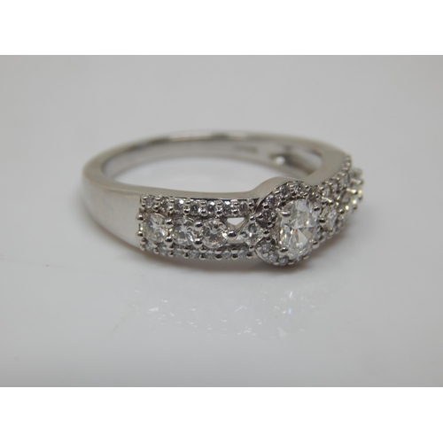 167 - 950 Platinum & Diamond Ring: Total Diamond Weight 0.75cts: Ring Size N/O: Gross weight 6.16g