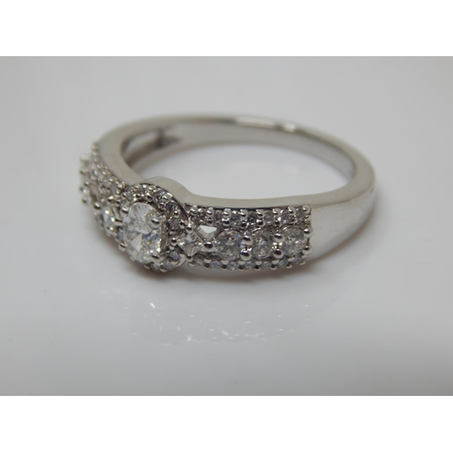 167 - 950 Platinum & Diamond Ring: Total Diamond Weight 0.75cts: Ring Size N/O: Gross weight 6.16g