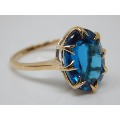 169 - 9ct Gold Blur Topaz Ring: 12.35ct: Ring Size N/O: Gross weight 5.45g