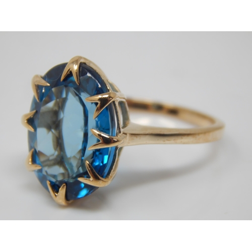 169 - 9ct Gold Blur Topaz Ring: 12.35ct: Ring Size N/O: Gross weight 5.45g