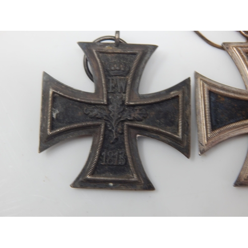 1M - Of Third Reich Interest pair of Iron Crosses WW1 and WW2