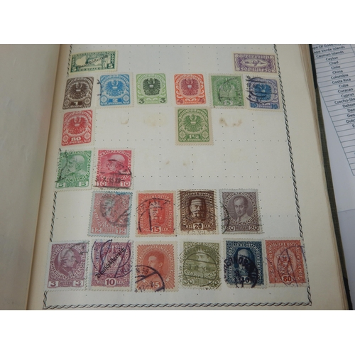 1Q - The Triumph Stamp Album containing over 3,000 stamps from Abyssinia to Venezuela all listed on typed... 