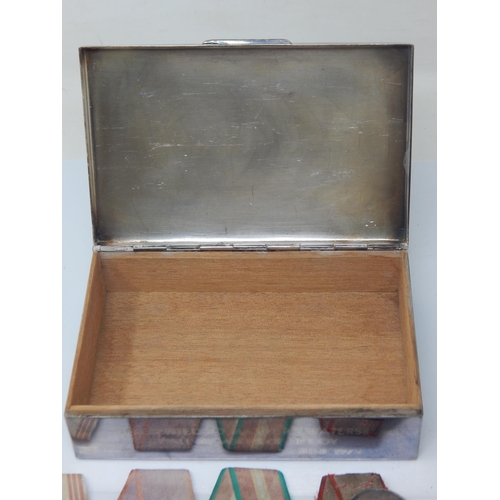 1V - Vintage Silver coloured box containing a selection of mainly Russian medals, badges, etc (lot)