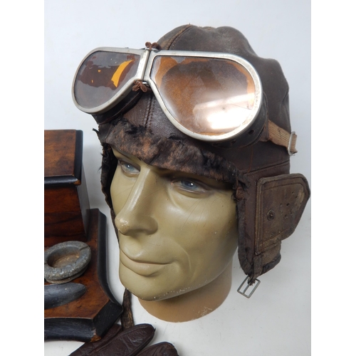 286 - WWI Flying Corps Group Including Helmet, Goggles, Gloves & Desk Stand.