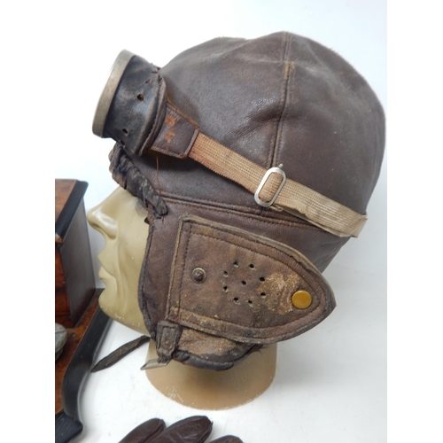 286 - WWI Flying Corps Group Including Helmet, Goggles, Gloves & Desk Stand.