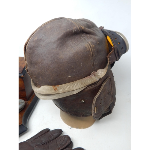 286 - WWI Flying Corps Group Including Helmet, Goggles, Gloves & Desk Stand.