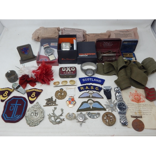 295 - A Quantity of Military Cloth & Metal Badges, Watches etc (lot)