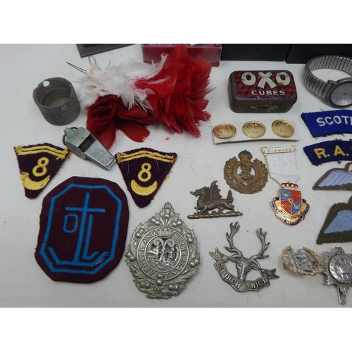 295 - A Quantity of Military Cloth & Metal Badges, Watches etc (lot)